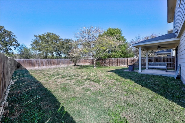 view of yard featuring ceiling fan