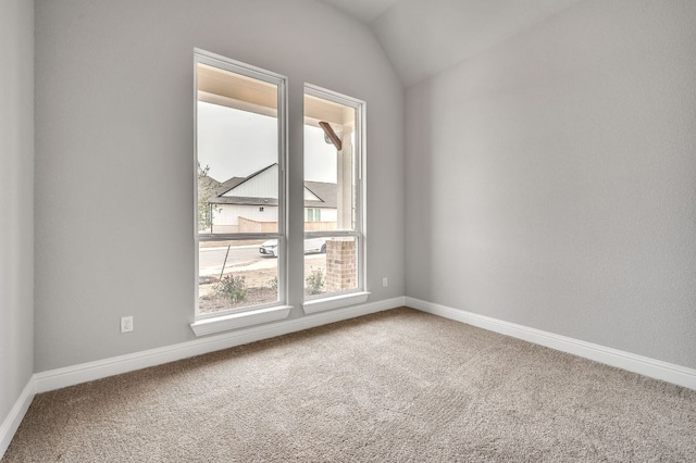 325 Crescent Heights Dr, Georgetown, TX 78628 - unfurnished room with carpet flooring, baseboards, and vaulted ceiling
