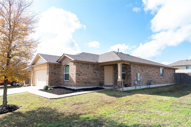 ranch-style home with a garage and a front yard