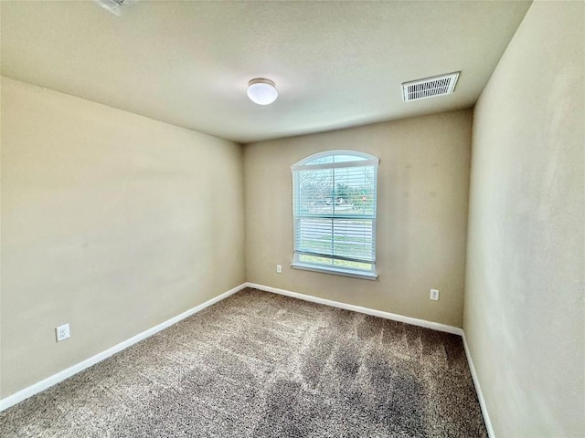 100 Wilson Ct, Hutto, TX 78634 - carpeted empty room with baseboards