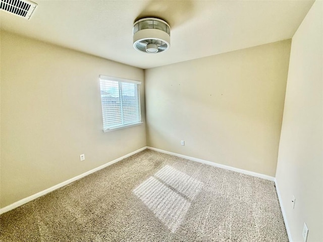 100 Wilson Ct, Hutto, TX 78634 - carpeted empty room with baseboards
