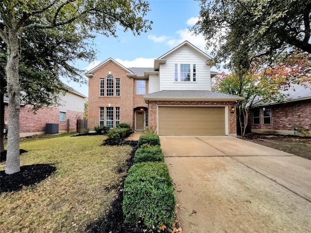 front facade with central AC, a garage, and a front lawn