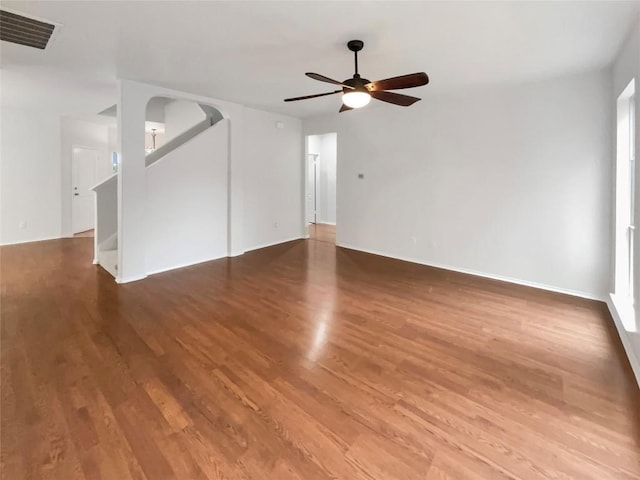 unfurnished living room with hardwood / wood-style floors and ceiling fan