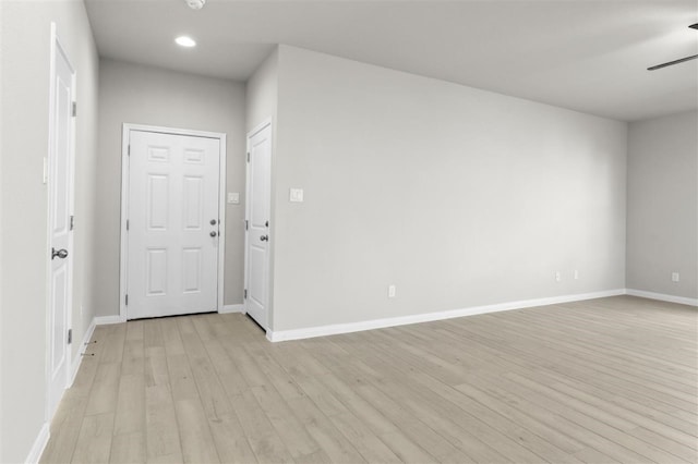 entryway featuring ceiling fan and light wood-type flooring