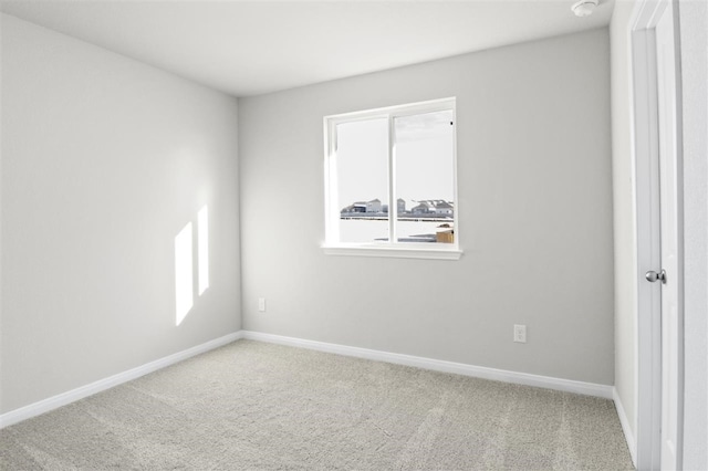 unfurnished room with carpet floors