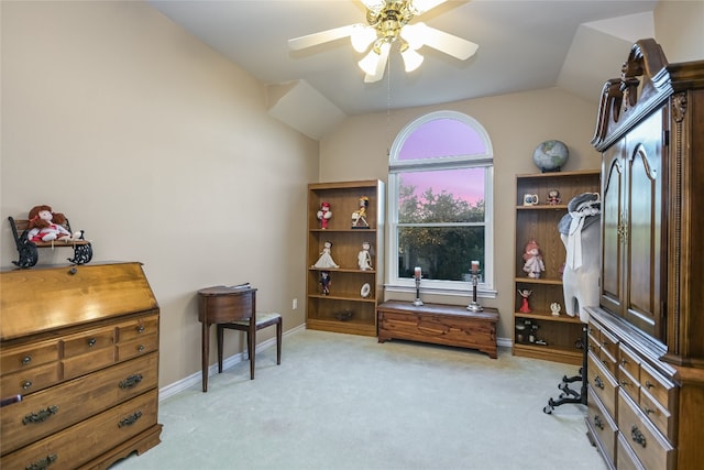 office with light carpet, vaulted ceiling, and ceiling fan