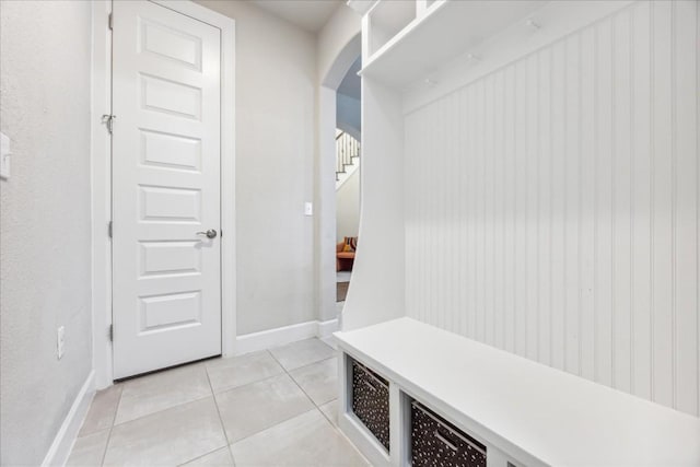 mudroom with light tile patterned flooring