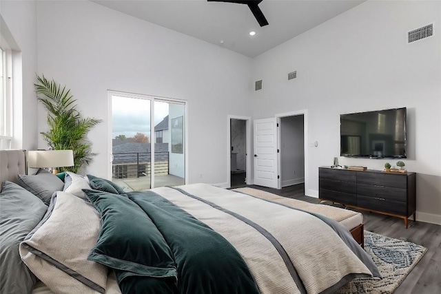 bedroom with high vaulted ceiling, dark hardwood / wood-style floors, ceiling fan, and access to outside