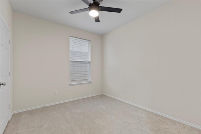 808 Beacon Hts, Seguin, TX 78155 - unfurnished bedroom with light colored carpet, baseboards, and ceiling fan