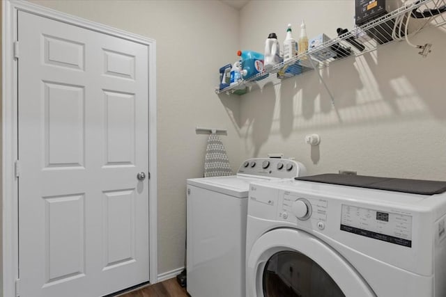 808 Beacon Hts, Seguin, TX 78155 - laundry room featuring separate washer and dryer and dark wood finished floors