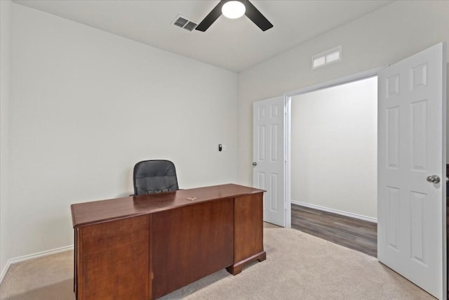808 Beacon Hts, Seguin, TX 78155 - unfurnished office with ceiling fan, light carpet, and baseboards