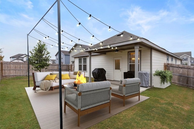 exterior space with an outdoor living space and a lawn