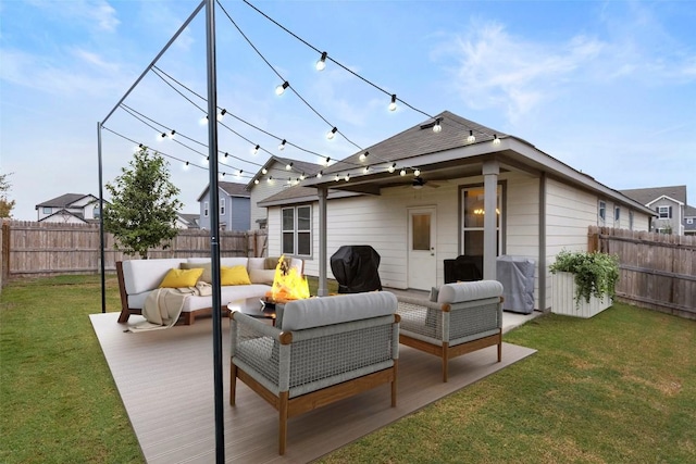 808 Beacon Hts, Seguin, TX 78155 - back of property featuring an outdoor living space with a fire pit, a ceiling fan, and a patio area