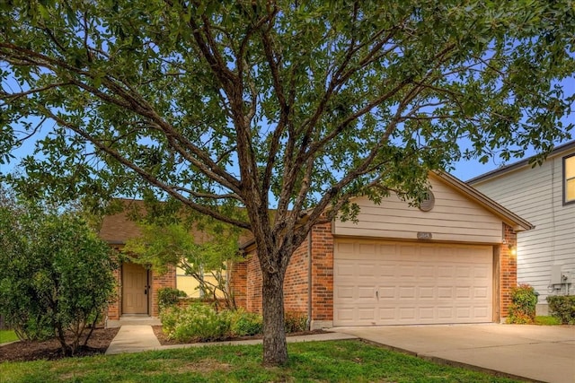 ranch-style house featuring a garage