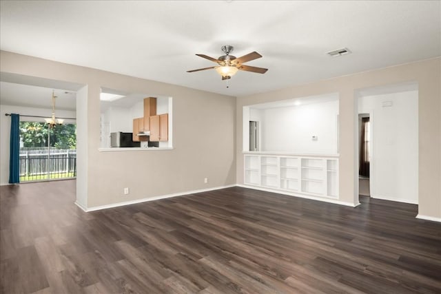 unfurnished living room with ceiling fan and dark wood-type flooring