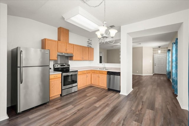 kitchen featuring sink, an inviting chandelier, dark hardwood / wood-style floors, light brown cabinetry, and appliances with stainless steel finishes