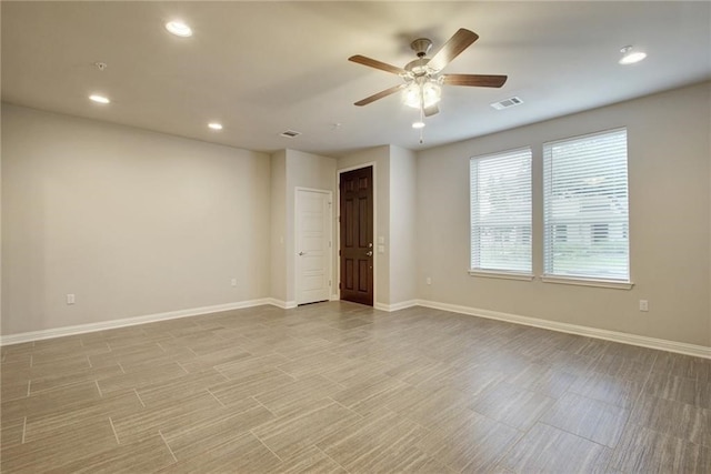 unfurnished room featuring ceiling fan