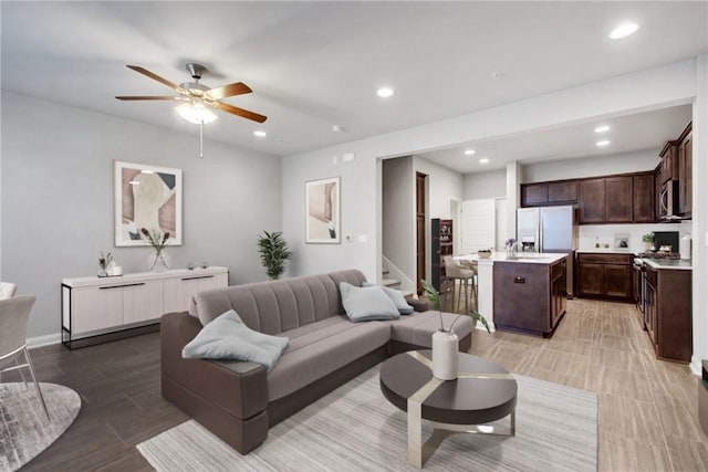 living room with ceiling fan