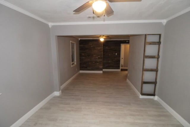 corridor featuring ornamental molding and light wood-type flooring