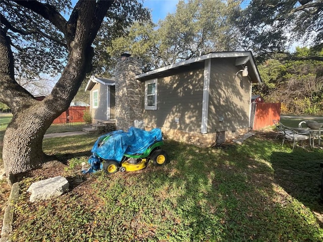 exterior space featuring a lawn