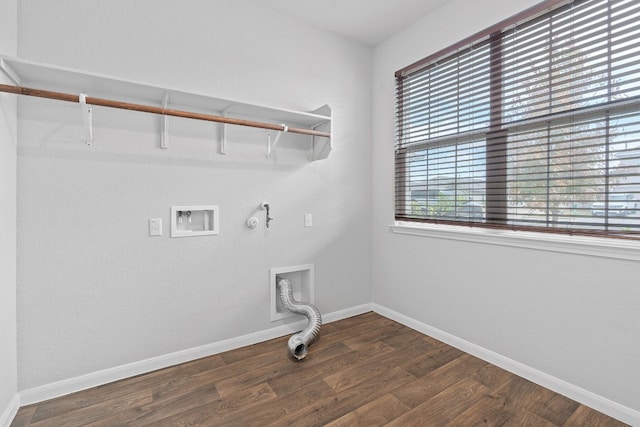 laundry area featuring washer hookup, hookup for a gas dryer, electric dryer hookup, and dark wood-type flooring