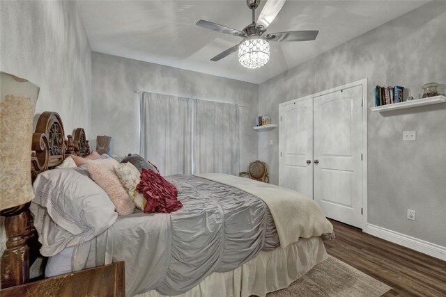 bedroom featuring hardwood / wood-style floors and ceiling fan