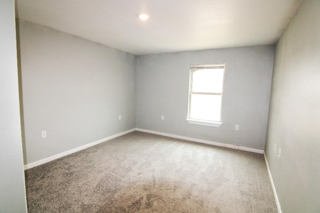 view of carpeted spare room