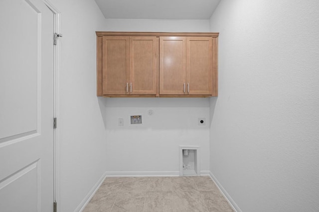 clothes washing area with electric dryer hookup, cabinets, hookup for a gas dryer, hookup for a washing machine, and light tile patterned floors