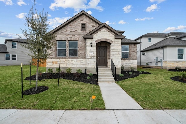 view of front of house with a front lawn