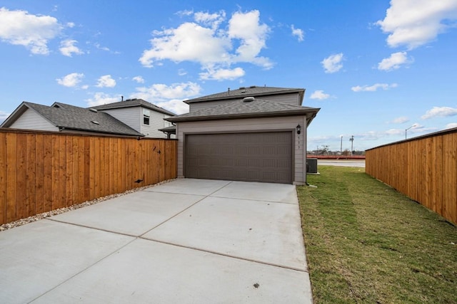 garage with a yard