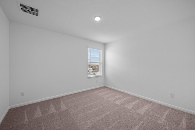 unfurnished room with carpet