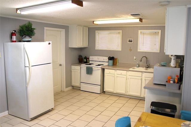 kitchen with a textured ceiling, white appliances, crown molding, sink, and white cabinetry