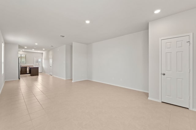 view of tiled spare room