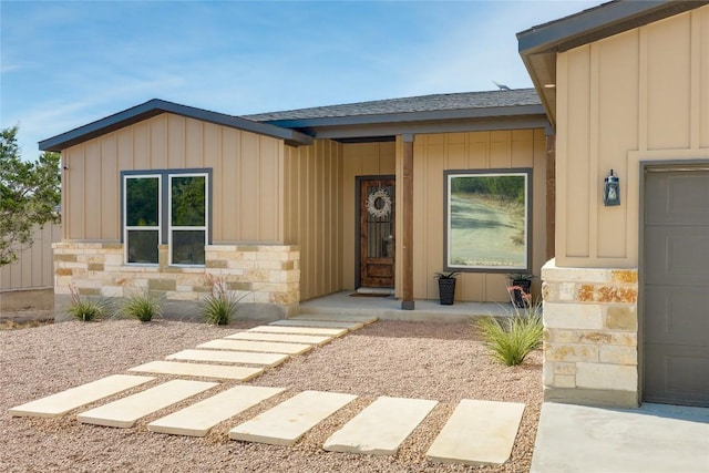 entrance to property featuring a garage