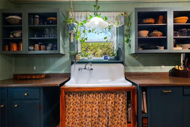 kitchen featuring backsplash and sink