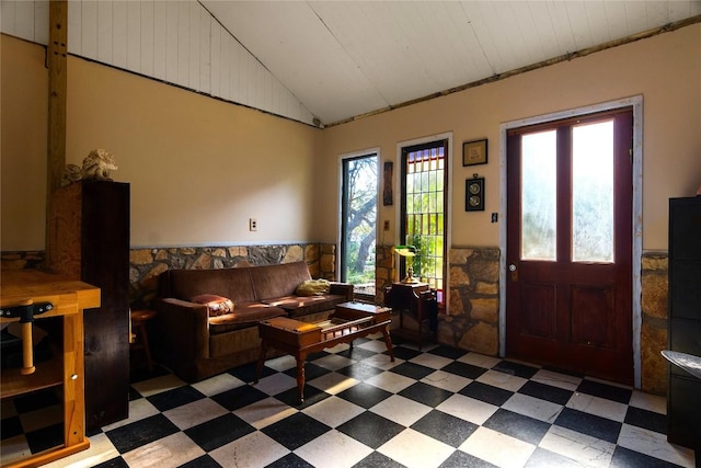 entryway featuring plenty of natural light and vaulted ceiling