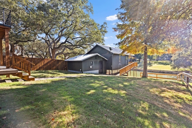 306 Bluebird Cir, Marble Falls, TX 78654 - fenced backyard with stairs