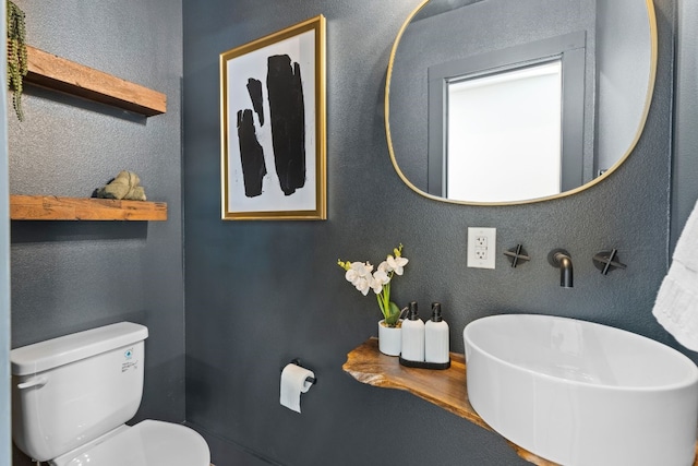 306 Bluebird Cir, Marble Falls, TX 78654 - bathroom with toilet and a sink