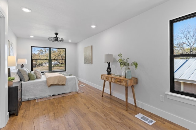 bedroom with light wood-type flooring