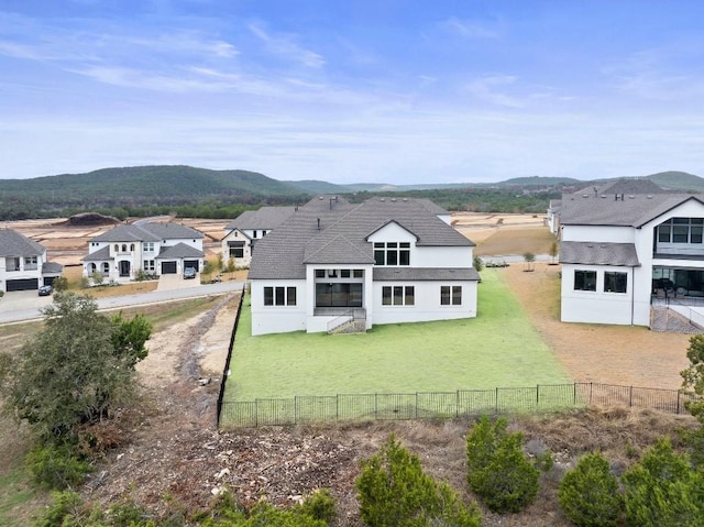 rear view of property with a mountain view