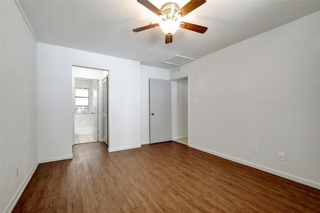 unfurnished bedroom with ceiling fan and wood-type flooring