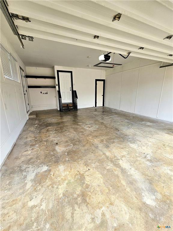 garage with a garage door opener