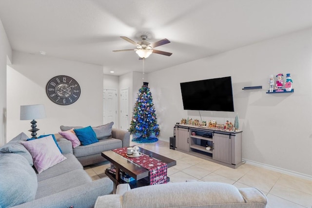 tiled living room featuring ceiling fan