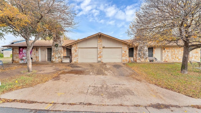 ranch-style home with a garage