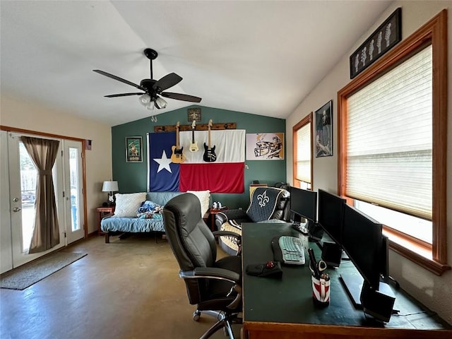 office space featuring ceiling fan, french doors, concrete floors, and lofted ceiling