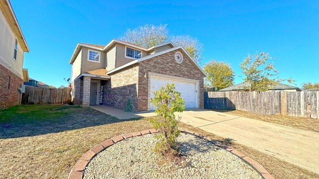 view of front property with a garage and a front lawn