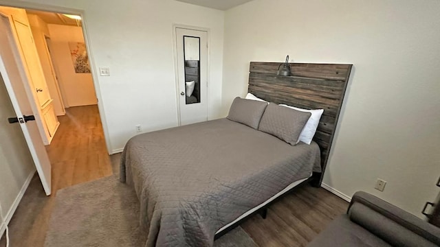 bedroom featuring hardwood / wood-style flooring