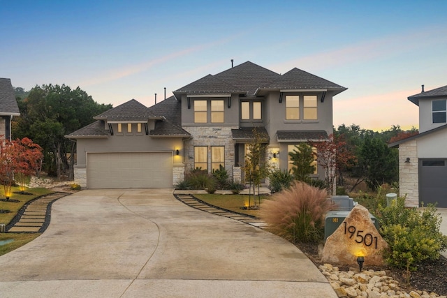 view of front of property with a garage