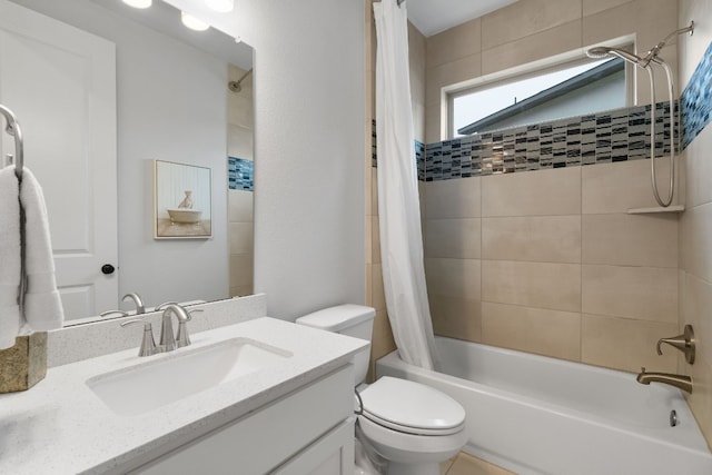 full bathroom with toilet, vanity, and shower / tub combo with curtain