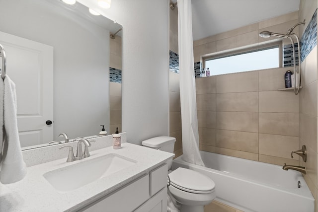 full bathroom featuring shower / bath combination with curtain, toilet, and vanity